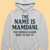The Name is Mamdani” Brown & White Hoodie front
