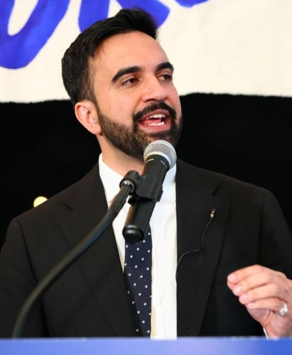 Zohran Mamdani’s Well Dressed black suit elecion