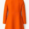 Elsbeth-2025-Carrie-Preston-Orange-Wool-Coat
