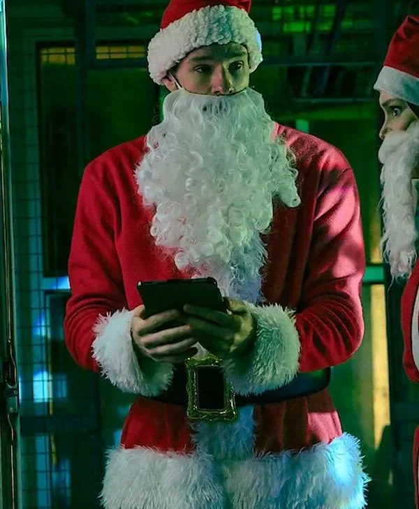 Jingle-Bell-Heist-2025-Connor-Swindells-Red-Velvet-Santa-Costume-Coat