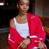 Get NBA London Game Naomi Ackie Red Jacket