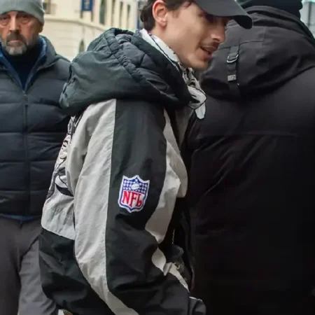 Timothée Chalamet Raiders Jacket side pose