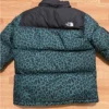 Supreme x The North Face Nuptse Green Leopard Print Jacket Shop Now