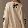 The Neighborhood S8 Mercedes Bow Sweatshirt for sale